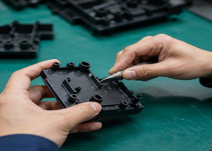 Injection Molding inspection detail scene in a modern manufacturing workshop