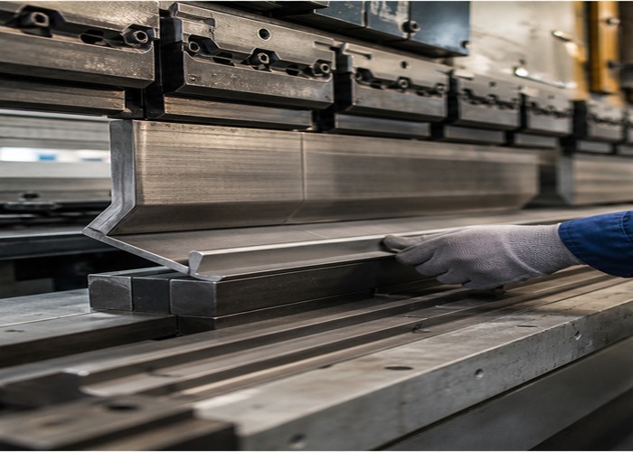 Sheet Metal Fabrication inspection detail scene in a modern manufacturing workshop