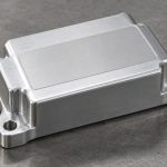 Metal housing with a broad blank identification area